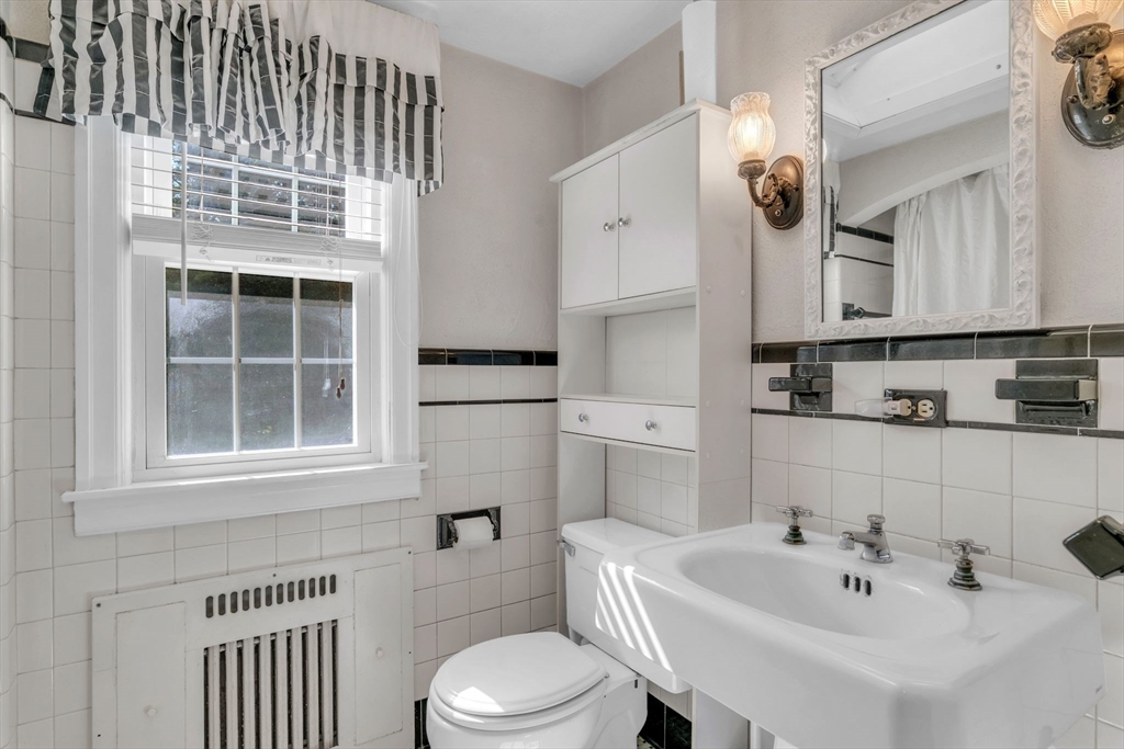1271 Plumtree Road Springfield, MA 01119 - Photo 24 of 41 a bathroom with a sink a toilet and bathtub