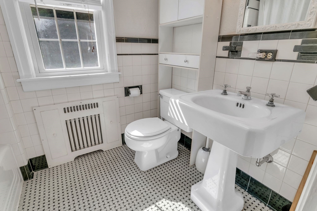 1271 Plumtree Road Springfield, MA 01119 - Photo 25 of 41 a bathroom with a sink toilet and shower