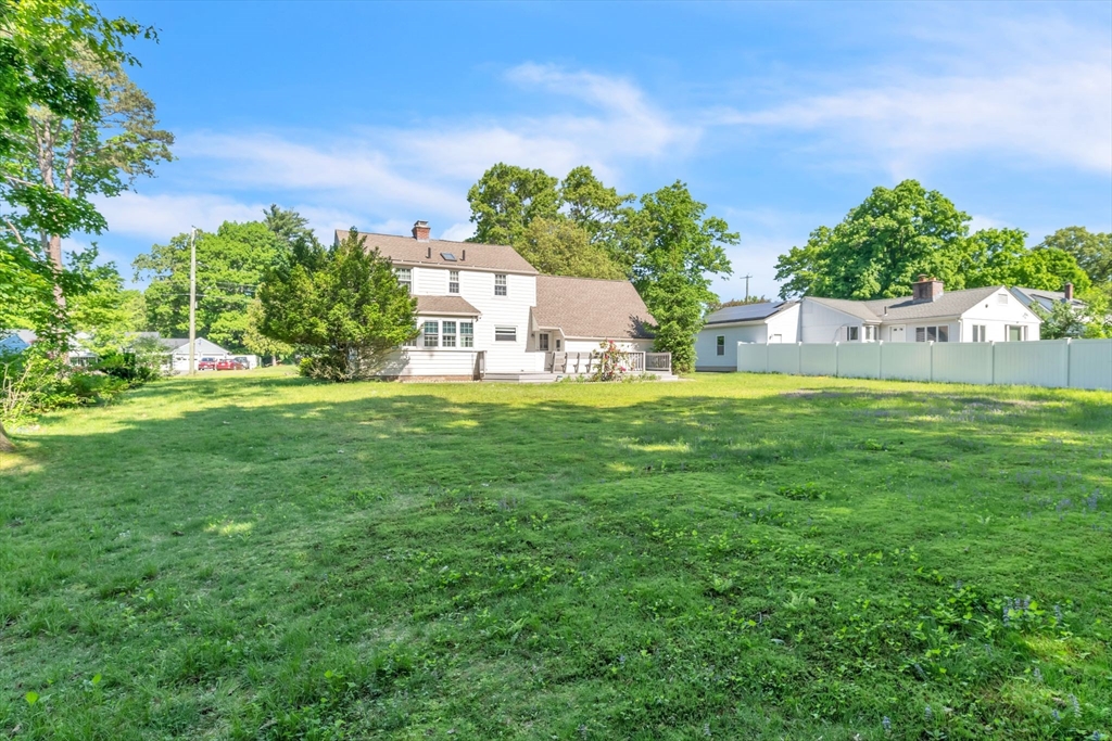 1271 Plumtree Road Springfield, MA 01119 - Photo 40 of 41 a view of a house with a big yard and potted plants