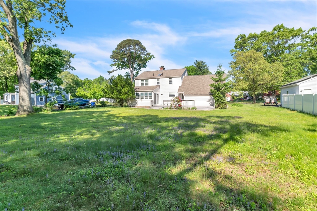 1271 Plumtree Road Springfield, MA 01119 - Photo 41 of 41 a view of a house with a big yard and large trees