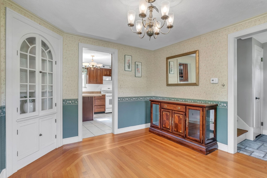 1271 Plumtree Road Springfield, MA 01119 - Photo 9 of 41 a bedroom with a bed and wooden floor