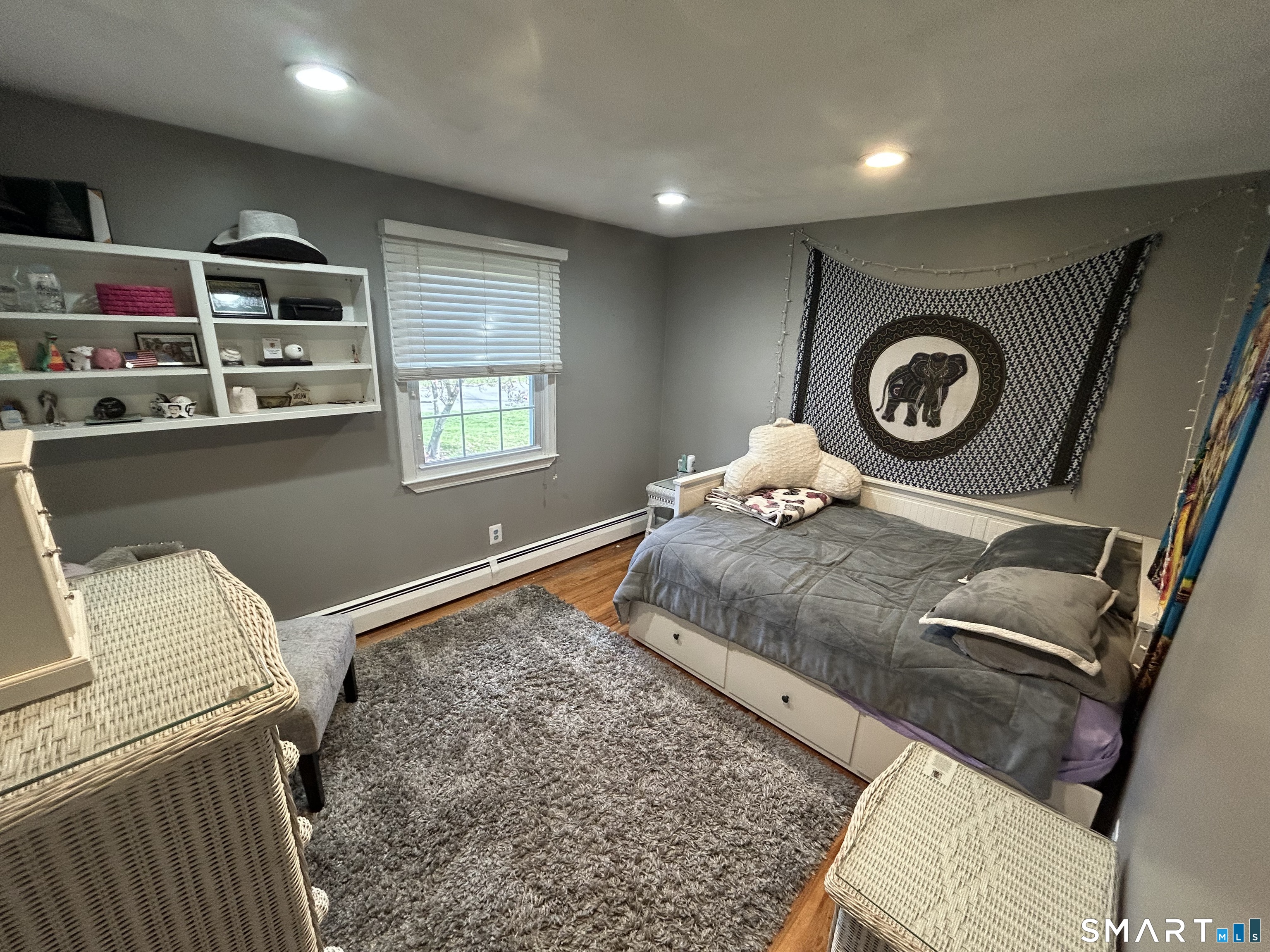72 Nolan Road Hamden, CT 06514 - Photo 12 of 37 a bedroom with a bed and cabinets
