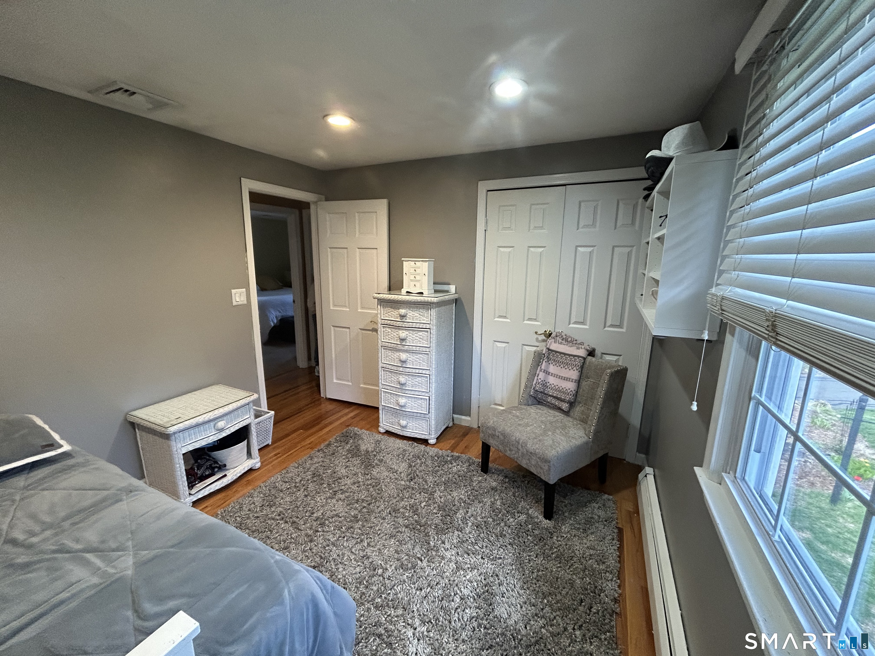 72 Nolan Road Hamden, CT 06514 - Photo 13 of 37 a living room with furniture and a rug