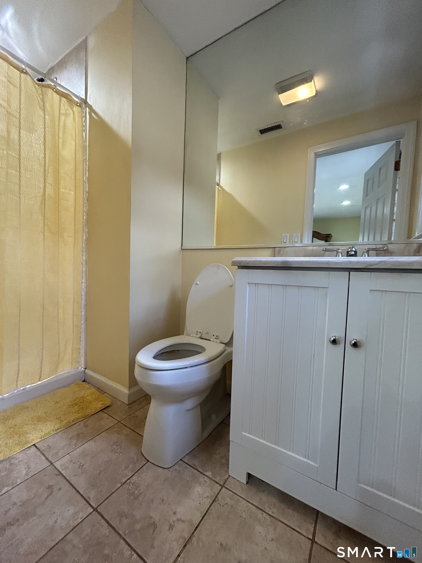 72 Nolan Road Hamden, CT 06514 - Photo 18 of 37 a bathroom with a toilet sink and shower