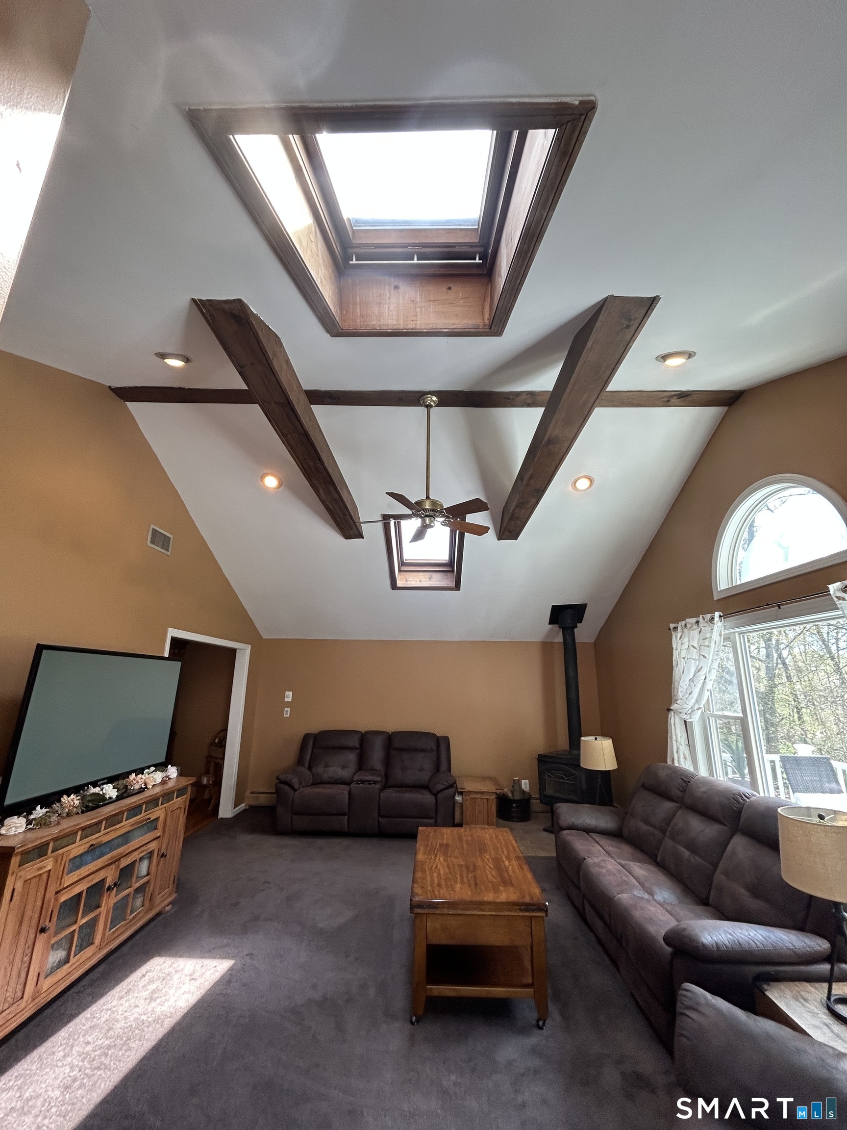 72 Nolan Road Hamden, CT 06514 - Photo 19 of 37 a living room with furniture and a chandelier
