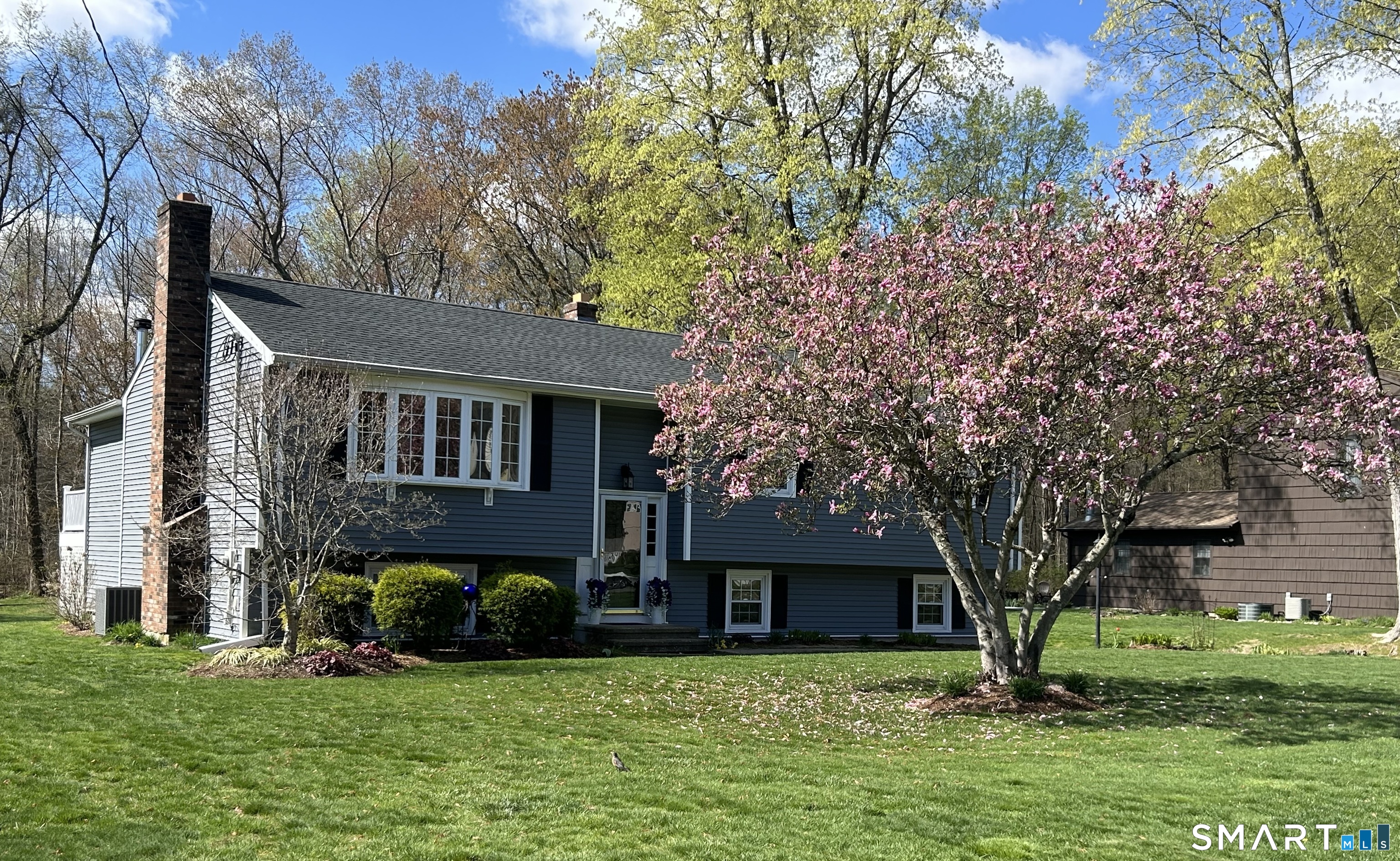 72 Nolan Road Hamden, CT 06514 - Photo 2 of 37 a view of a building with a yard