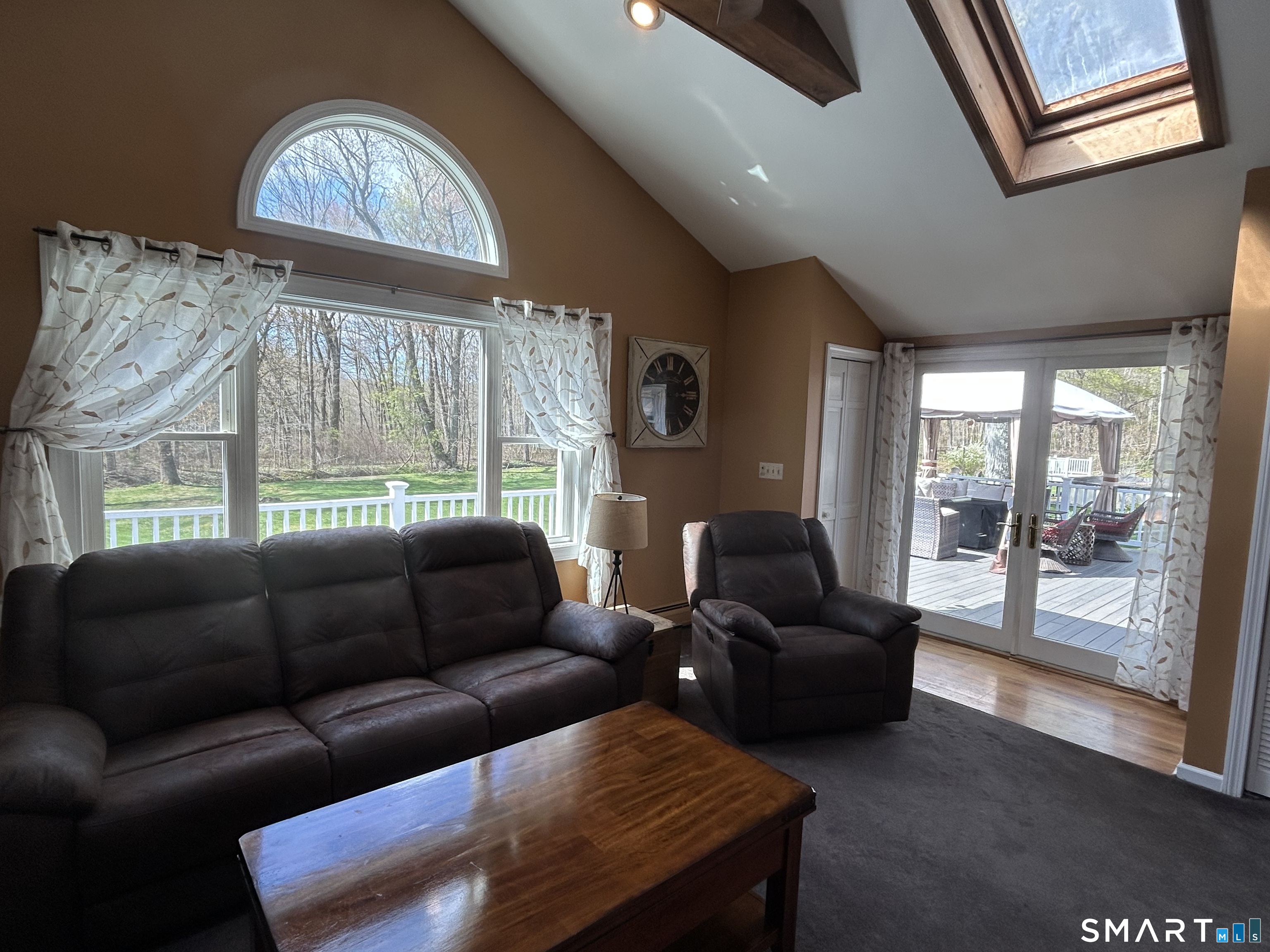 72 Nolan Road Hamden, CT 06514 - Photo 21 of 37 a living room with furniture and a large window