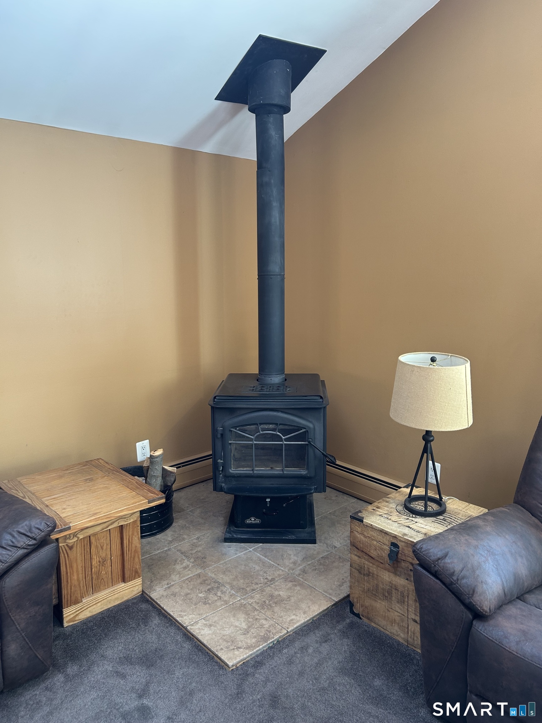72 Nolan Road Hamden, CT 06514 - Photo 22 of 37 a living room with furniture and a lamp