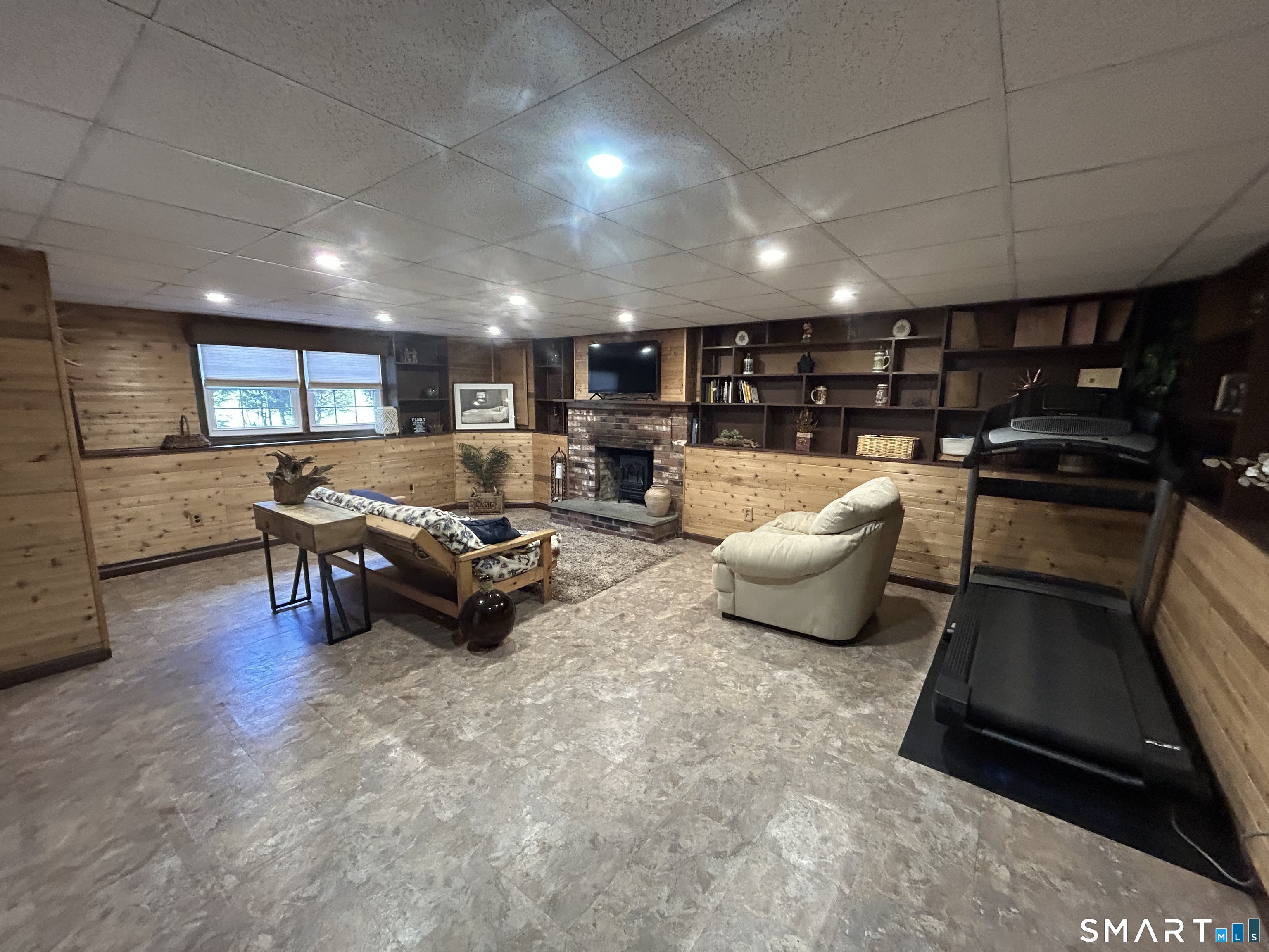 72 Nolan Road Hamden, CT 06514 - Photo 24 of 37 a living room with furniture and a flat screen tv