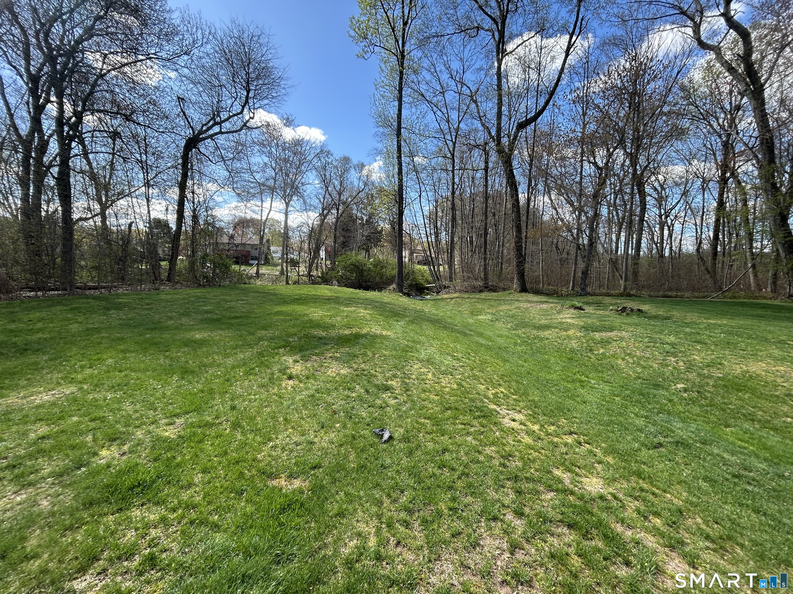 72 Nolan Road Hamden, CT 06514 - Photo 36 of 37 a view of a field of grass and trees