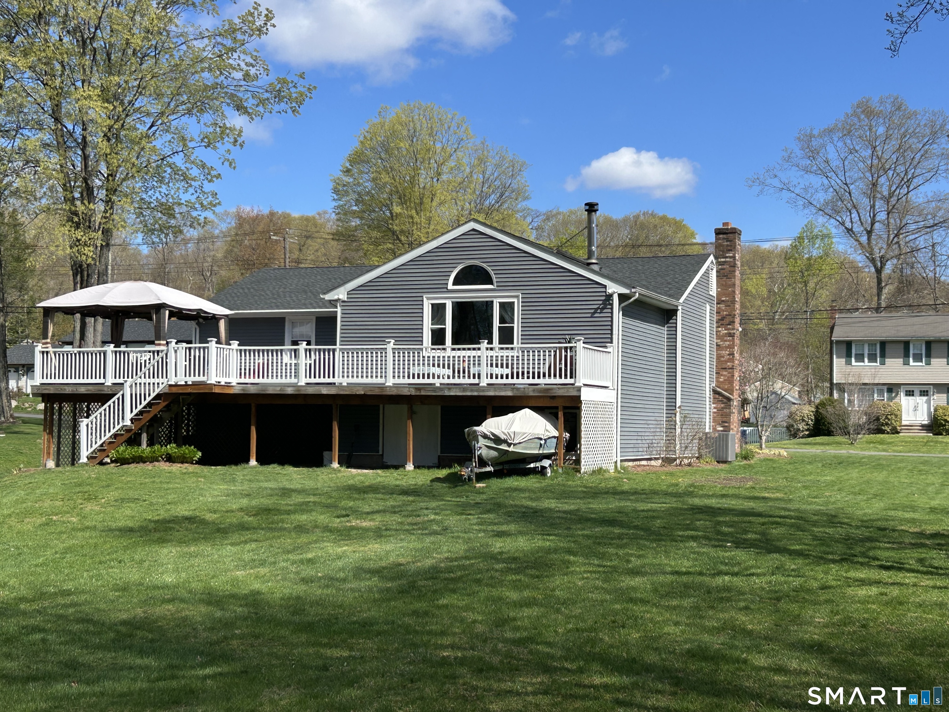 72 Nolan Road Hamden, CT 06514 - Photo 37 of 37 a front view of a house with garden and trees