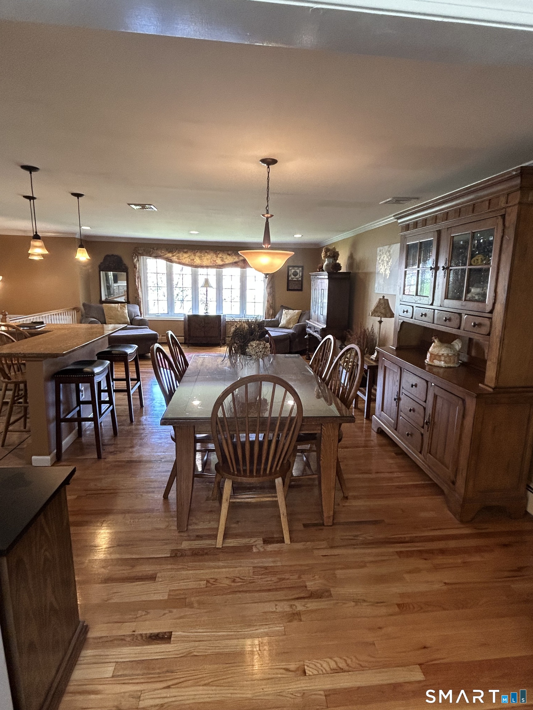 72 Nolan Road Hamden, CT 06514 - Photo 8 of 37 a view of a dining room with furniture window and wooden floor