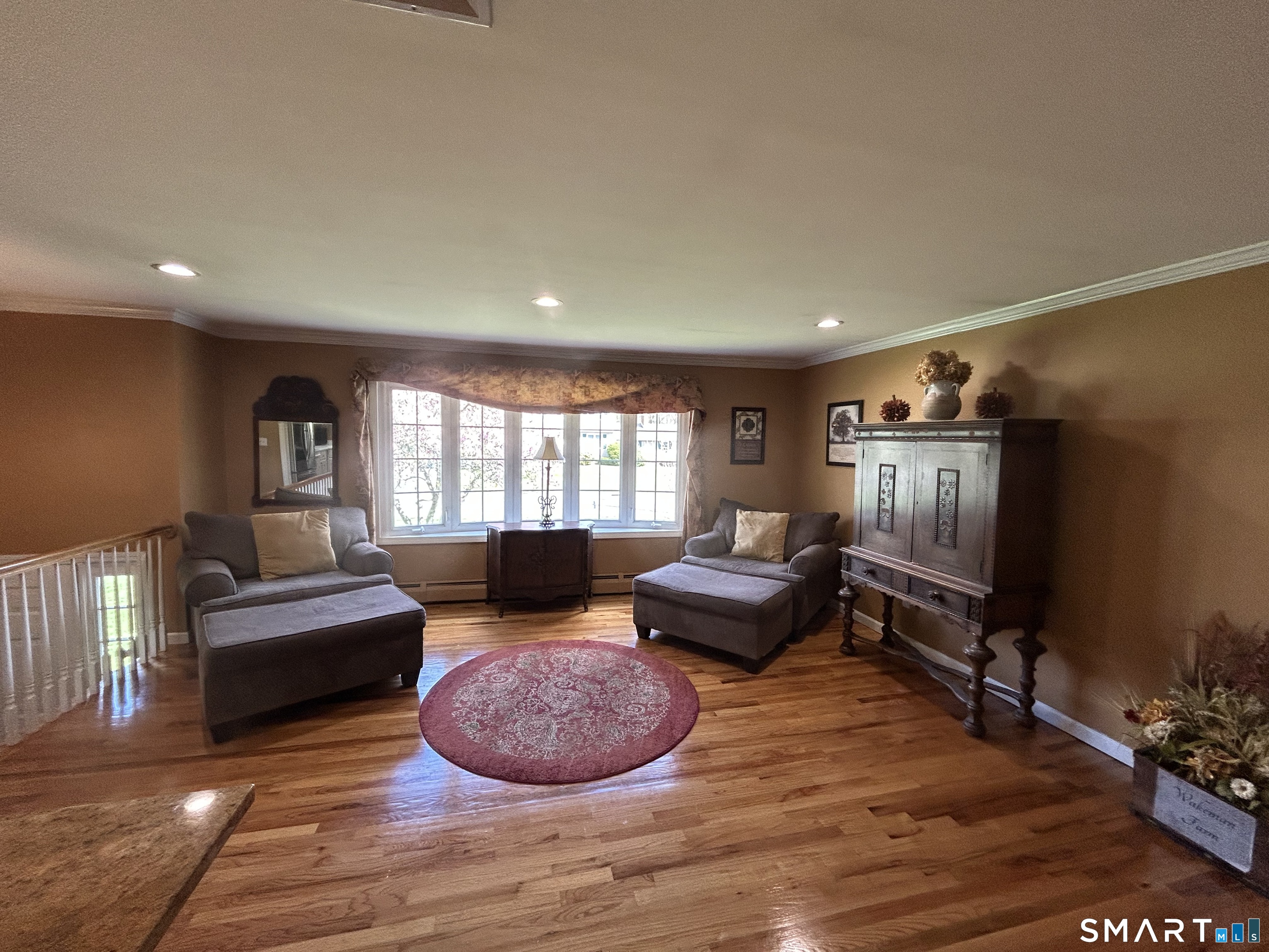 72 Nolan Road Hamden, CT 06514 - Photo 9 of 37 a living room with furniture and a flat screen tv