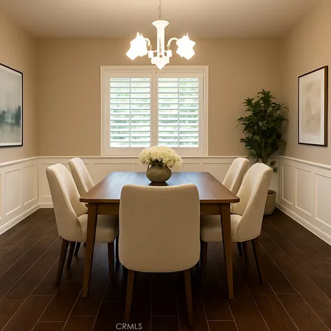 a dining room with furniture and window