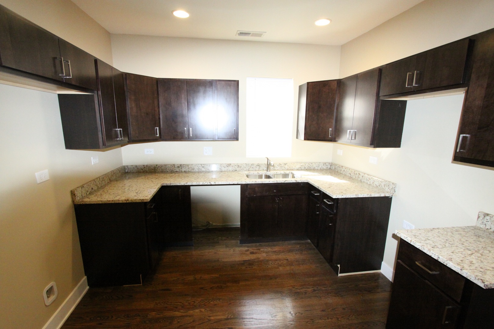 111 West 74th Street Chicago, IL 60621 - Photo 6 of 10 a bathroom with a granite countertop double vanity sink and mirror