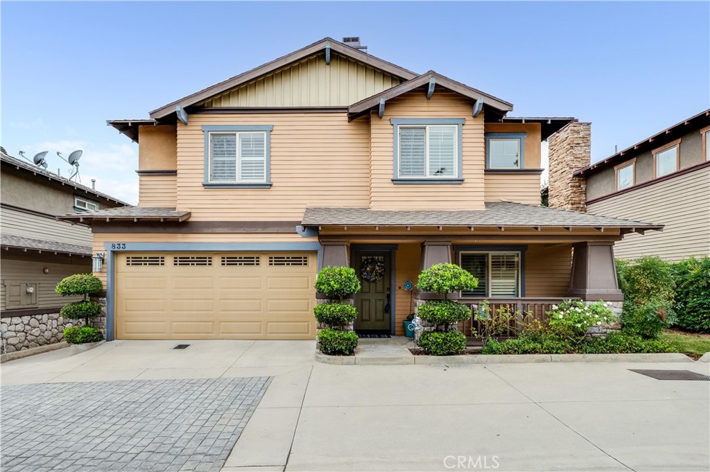 833 Sequoia Circle Monrovia, CA 91016 - Photo 1 of 1 a front view of a house with a yard and garage