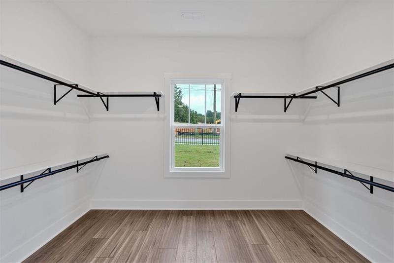 133 Old Alabama Road Southeast Emerson, GA 30137 - Photo 22 of 44 a view of a room with wooden floors and a window