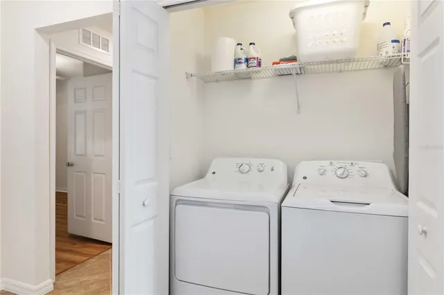 a utility room with dryer and washer