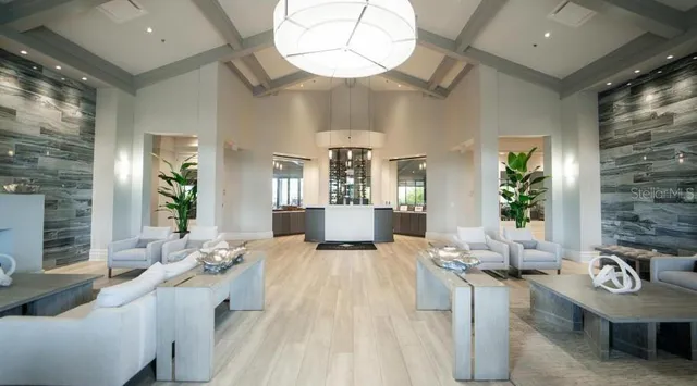 a view of a living room and dining room