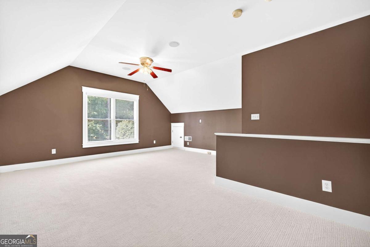 4492 Oakdale Road Southeast Smyrna, GA 30080 - Photo 25 of 37 a view of an empty room with a window