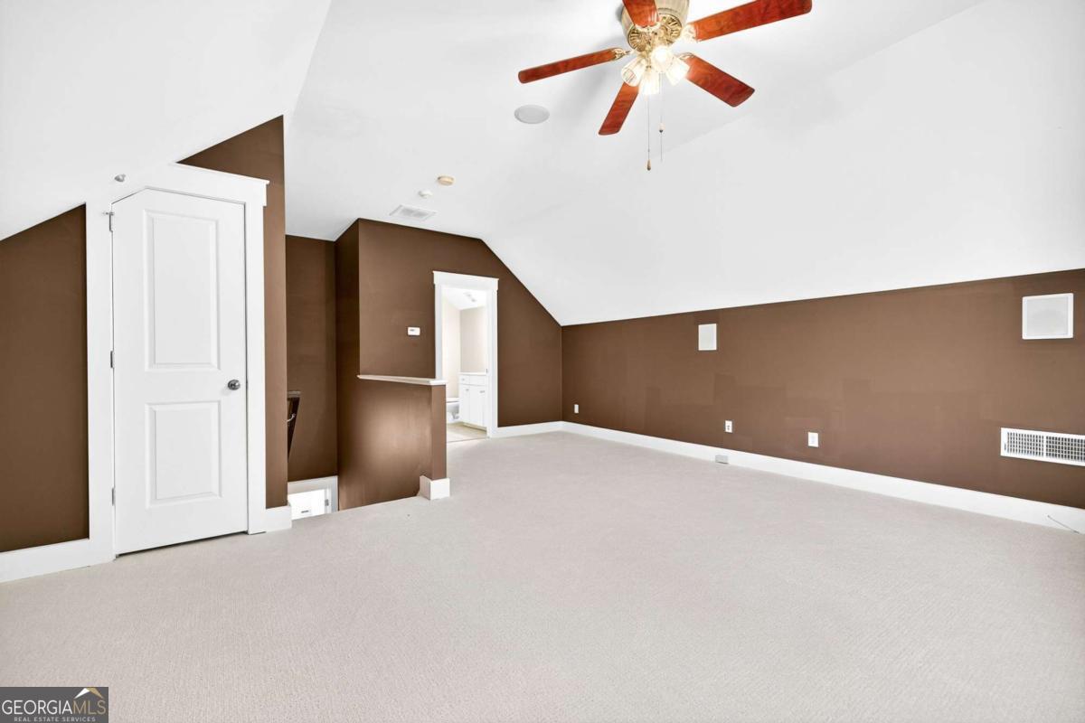 4492 Oakdale Road Southeast Smyrna, GA 30080 - Photo 26 of 37 a view of an empty room