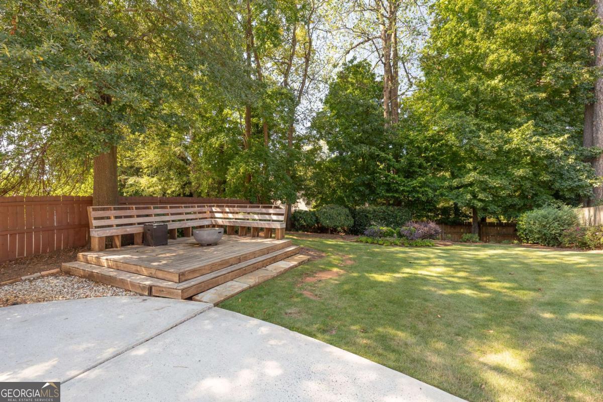 4492 Oakdale Road Southeast Smyrna, GA 30080 - Photo 28 of 37 a view of a swimming pool with a patio