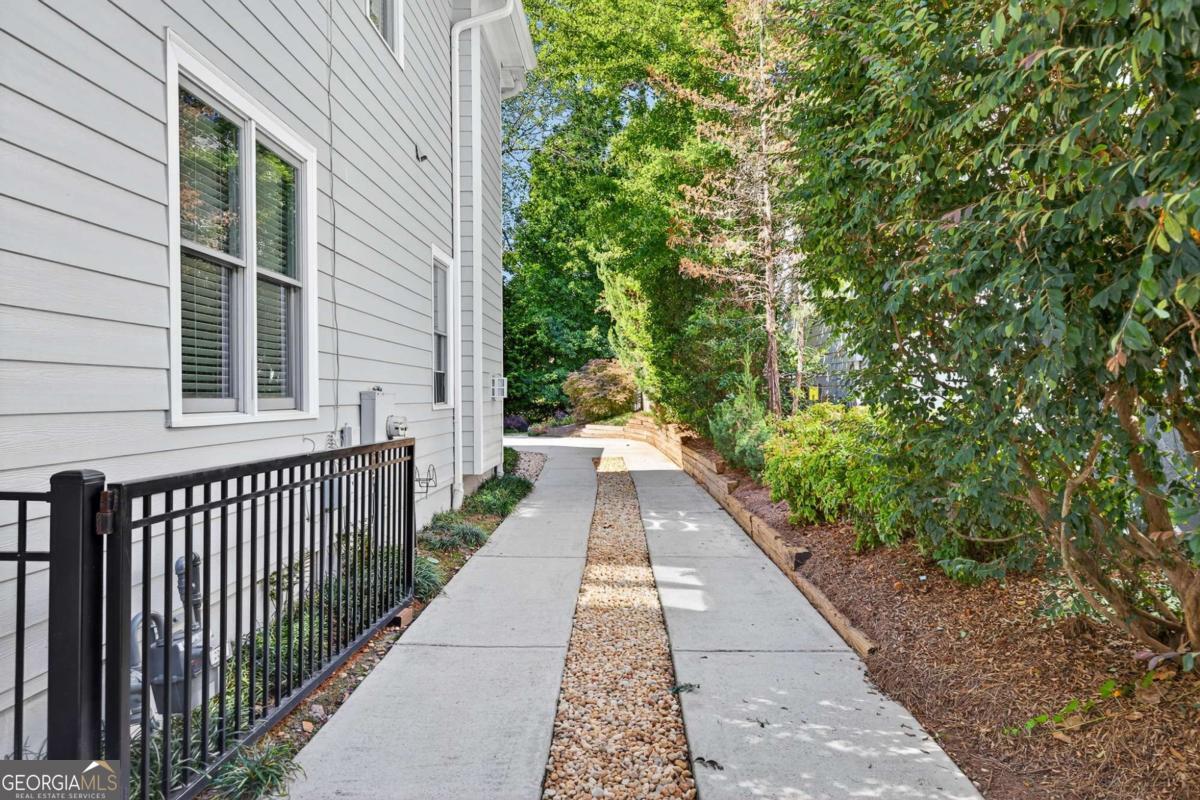 4492 Oakdale Road Southeast Smyrna, GA 30080 - Photo 30 of 37 a view of a house with a porch