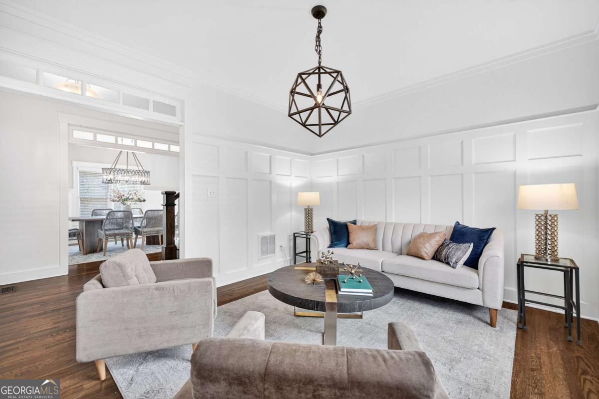 4492 Oakdale Road Southeast Smyrna, GA 30080 - Photo 4 of 37 a living room with furniture or couch and a wooden floor