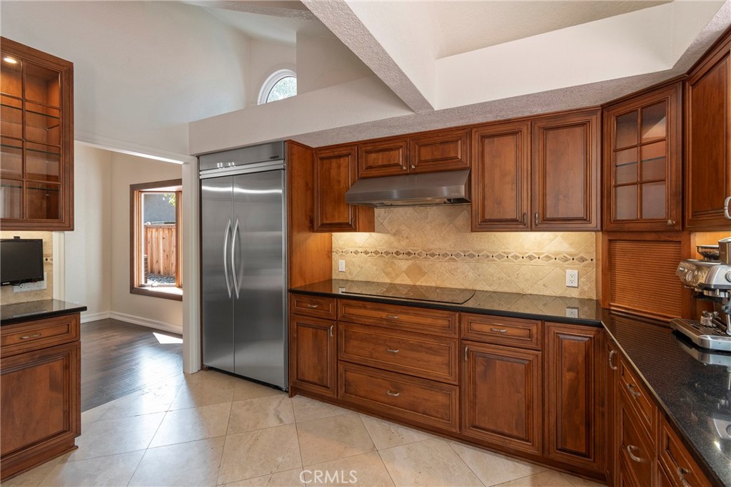 24741 Eldamar Avenue Lake Forest, CA 92630 - Photo 11 of 67 a kitchen with granite countertop stainless steel appliances and wooden cabinets