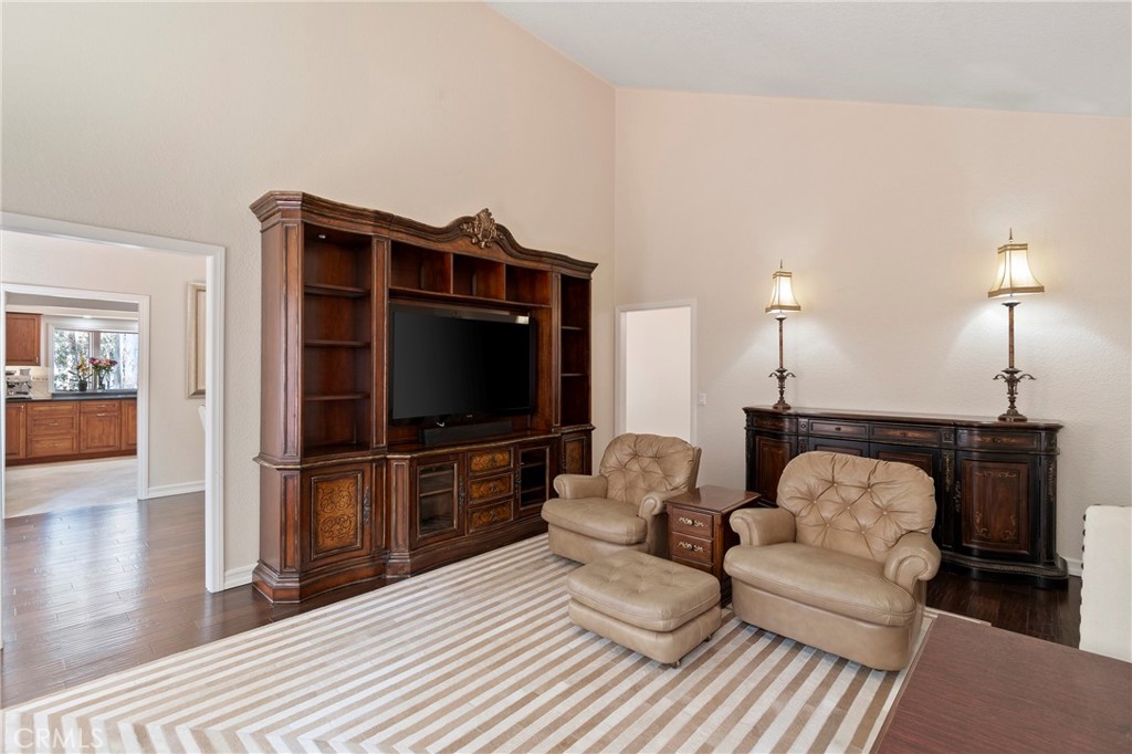 24741 Eldamar Avenue Lake Forest, CA 92630 - Photo 18 of 67 a living room with furniture and a flat screen tv