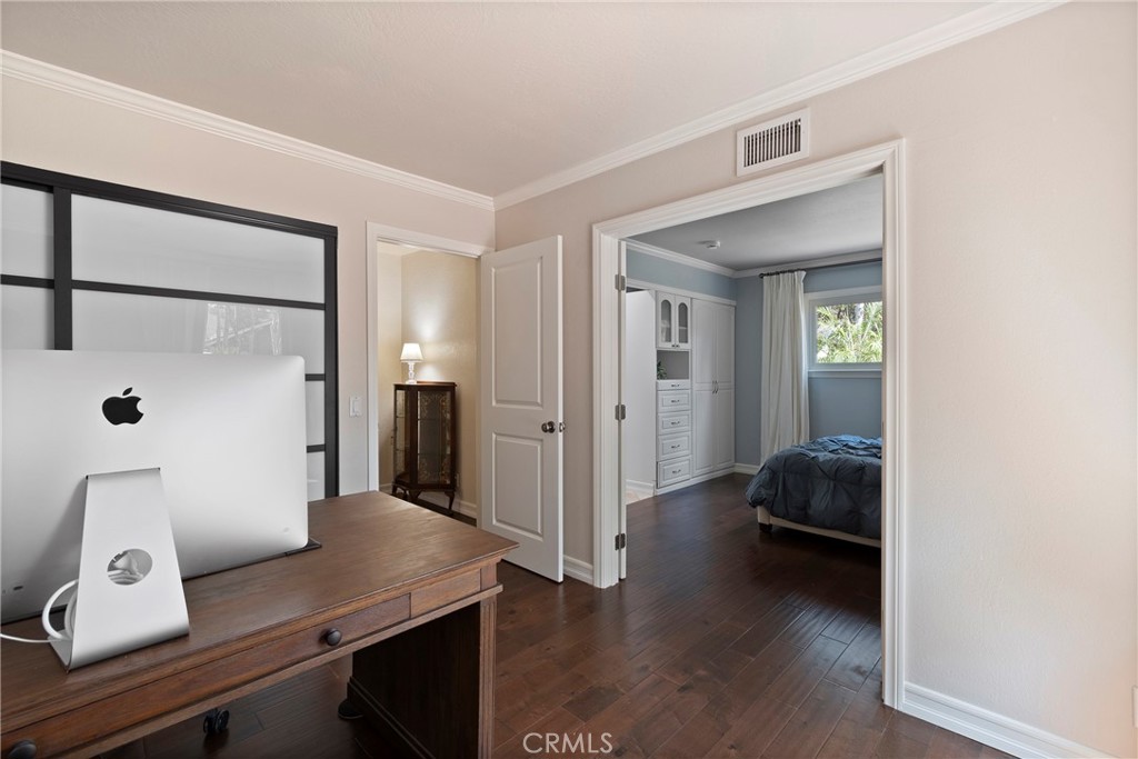 24741 Eldamar Avenue Lake Forest, CA 92630 - Photo 20 of 67 a view of a hallway to a livingroom and a couch