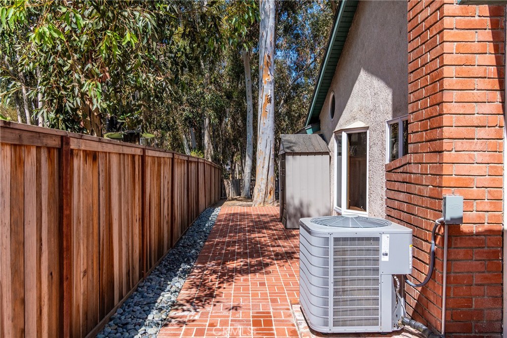 24741 Eldamar Avenue Lake Forest, CA 92630 - Photo 32 of 67 a front view of a house with a garden