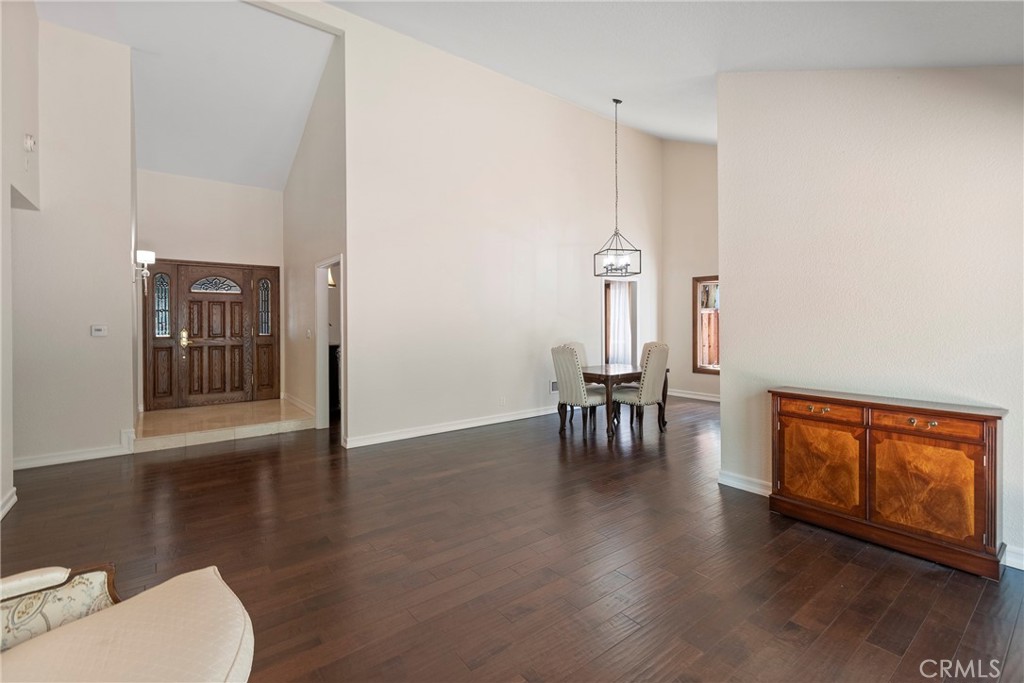 24741 Eldamar Avenue Lake Forest, CA 92630 - Photo 7 of 67 a view of dining room with furniture and wooden floor