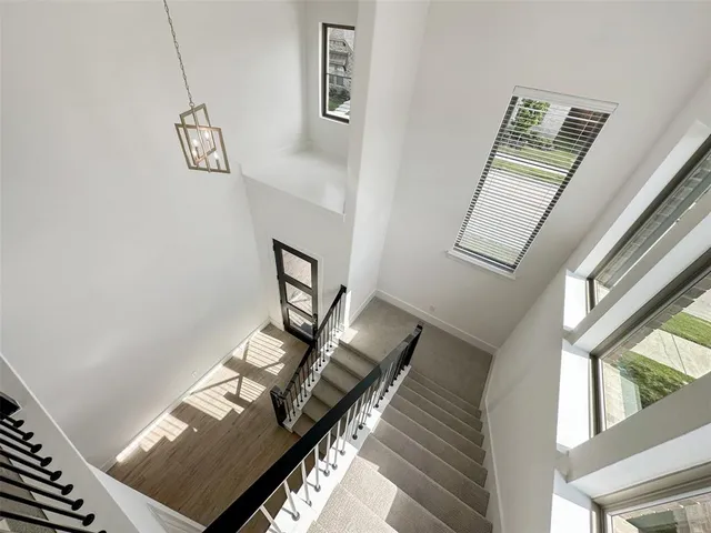 a view of an entryway with wooden floor