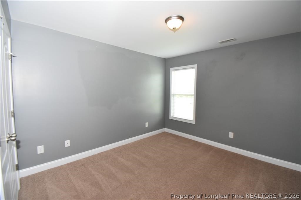 131 South Prince Henry Way Cameron, NC 28326 - Photo 15 of 26 an empty room with a window