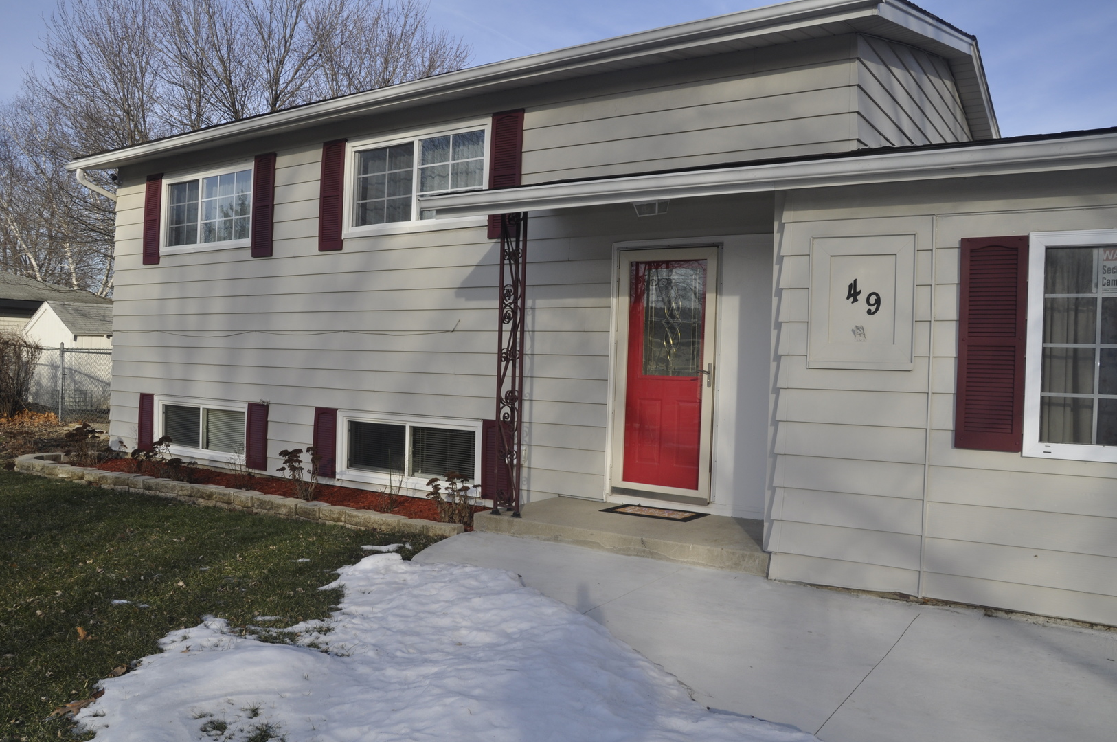 49 Pueblo Road Montgomery, IL 60538 - Photo 2 of 35 front view of a house with a yard