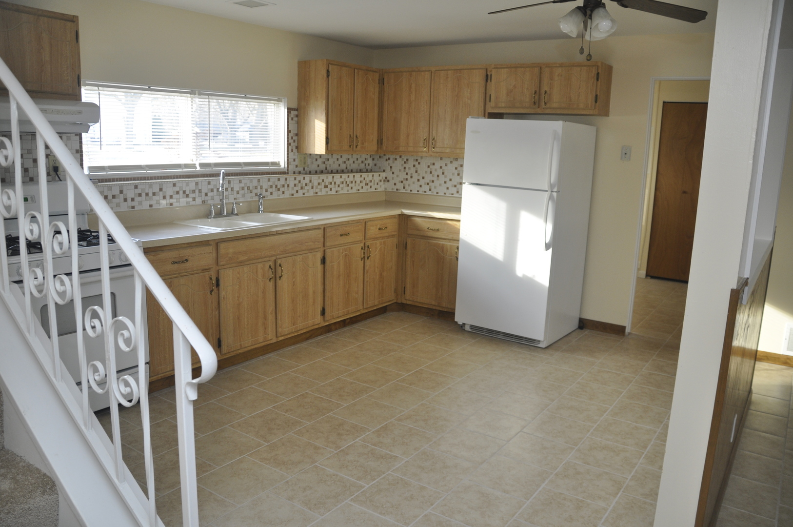 49 Pueblo Road Montgomery, IL 60538 - Photo 15 of 35 a view of a kitchen with washer and dryer