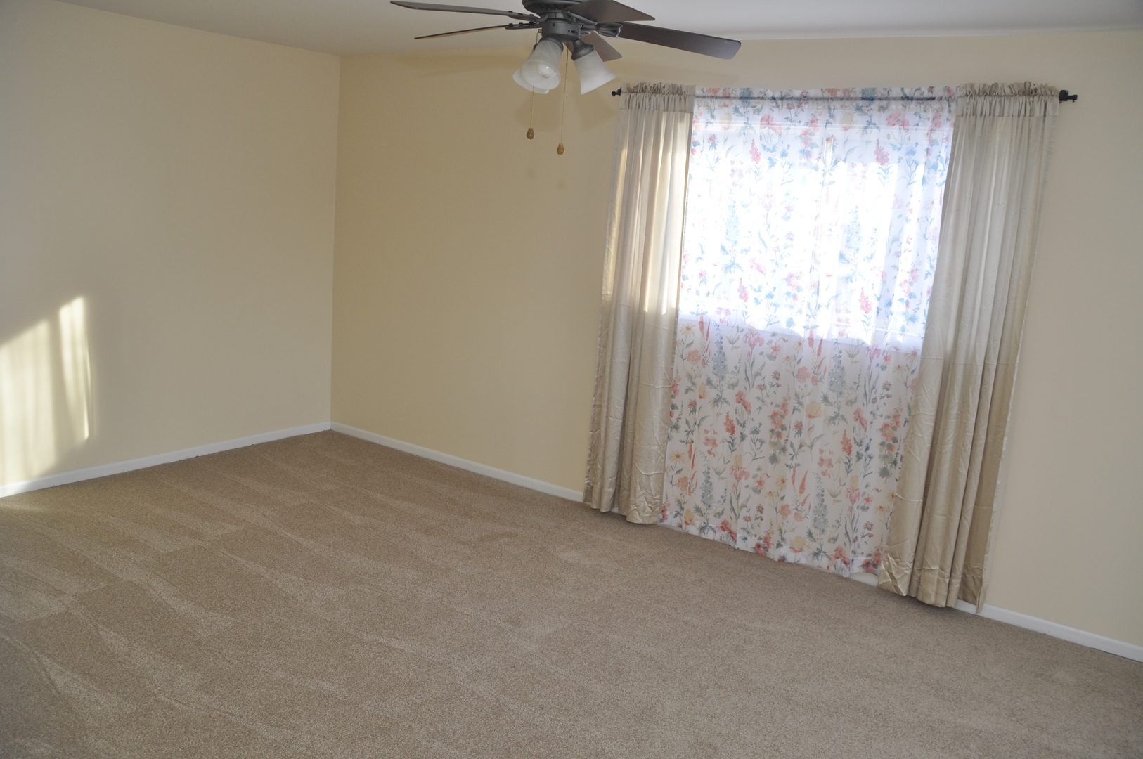 49 Pueblo Road Montgomery, IL 60538 - Photo 27 of 35 a view of an empty room and a window