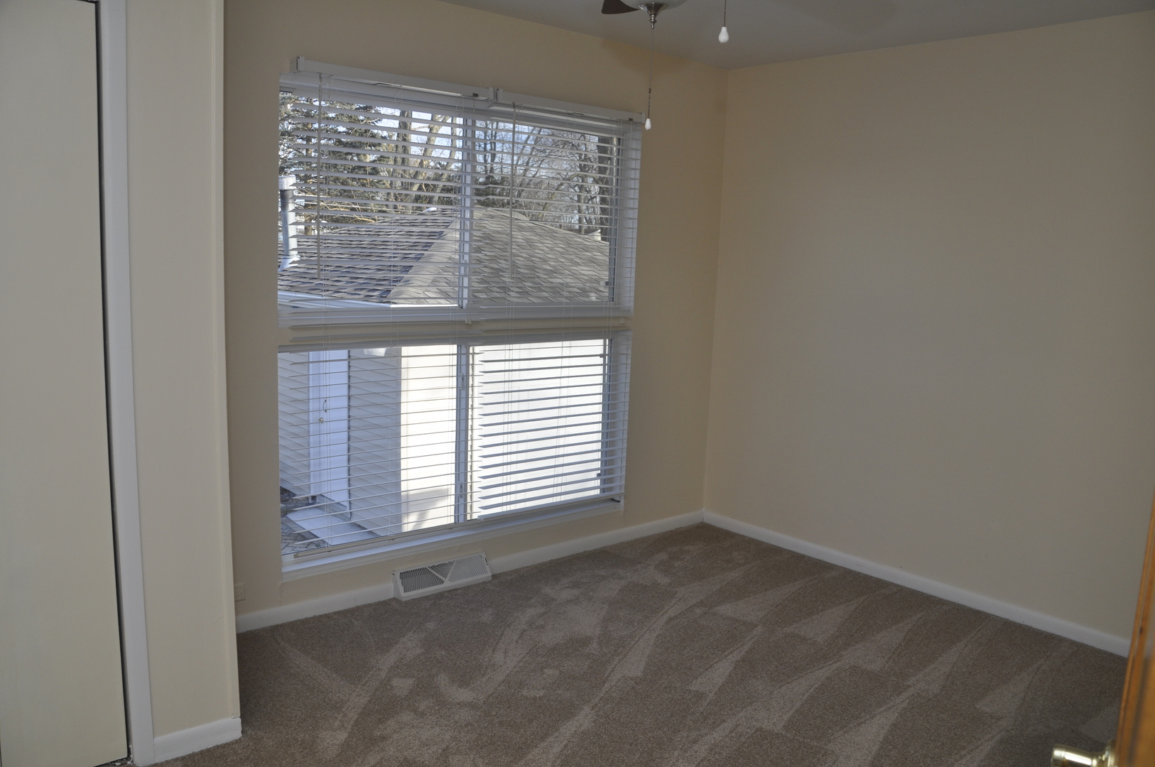 49 Pueblo Road Montgomery, IL 60538 - Photo 31 of 35 a view of an empty room with a window