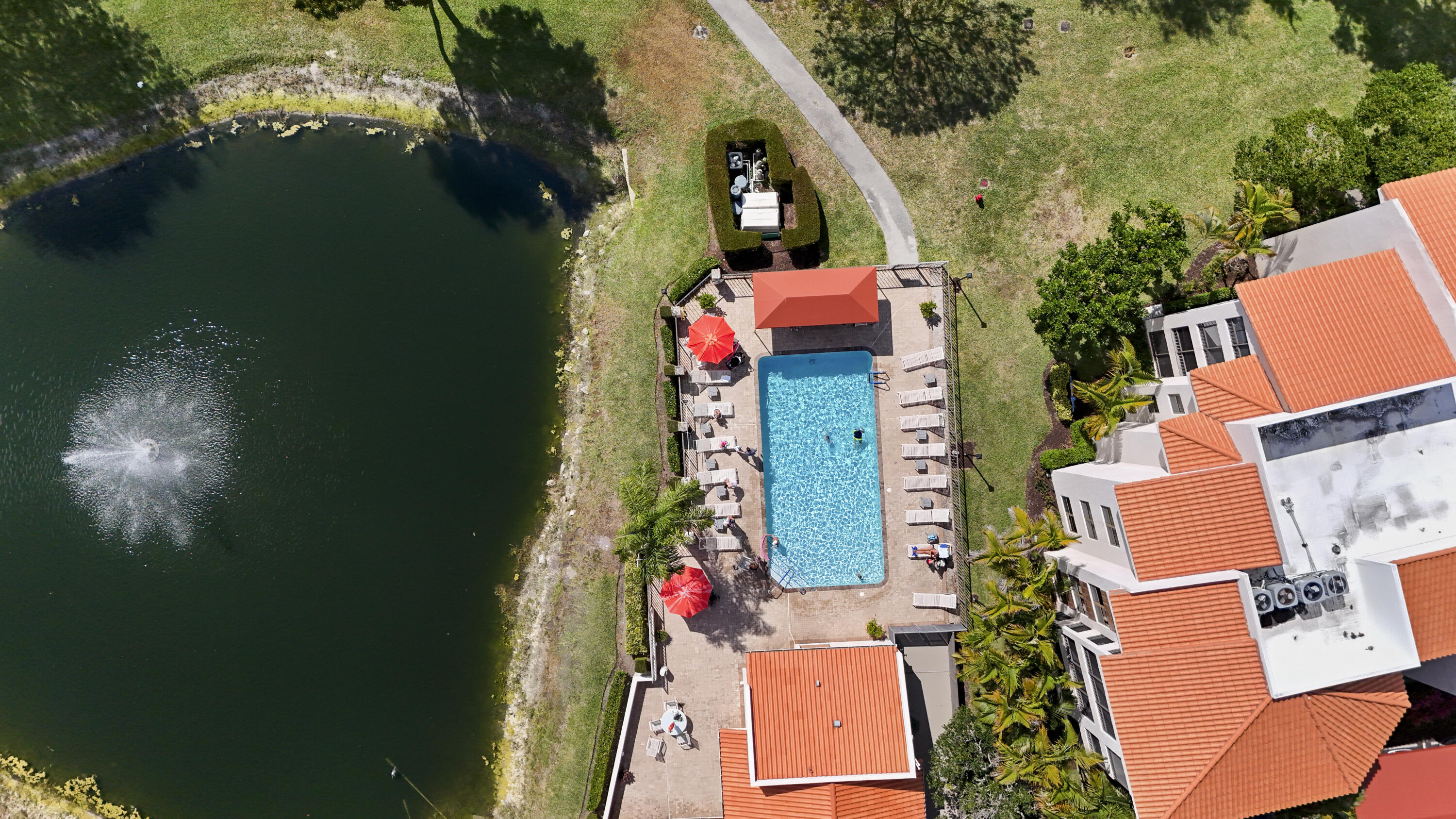 7507 La Paz Boulevard, Unit 407 Boca Raton, FL 33433 - Photo 24 of 31 an aerial view of residential houses with outdoor space
