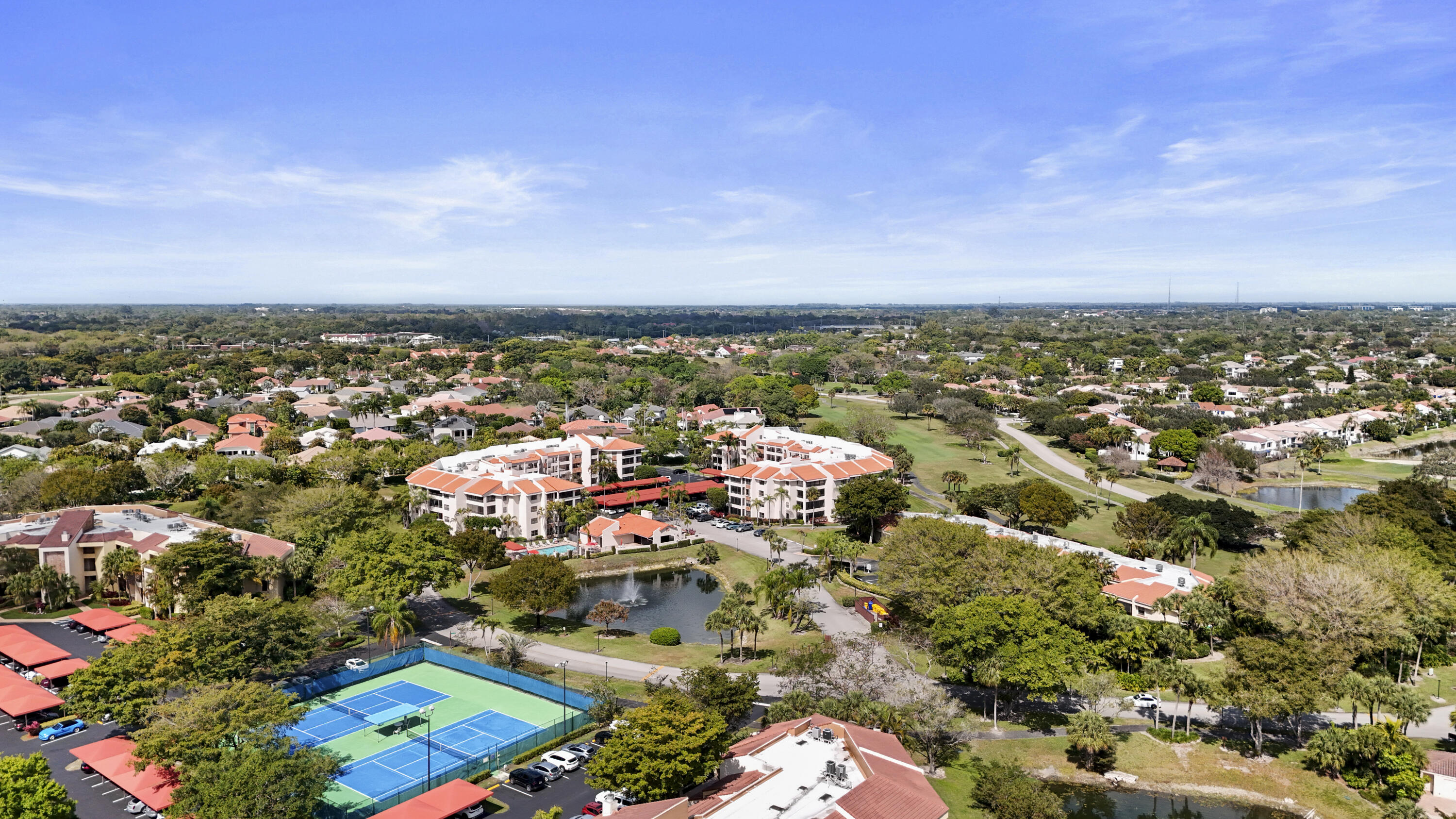 7507 La Paz Boulevard, Unit 407 Boca Raton, FL 33433 - Photo 28 of 31 an aerial view of multiple house