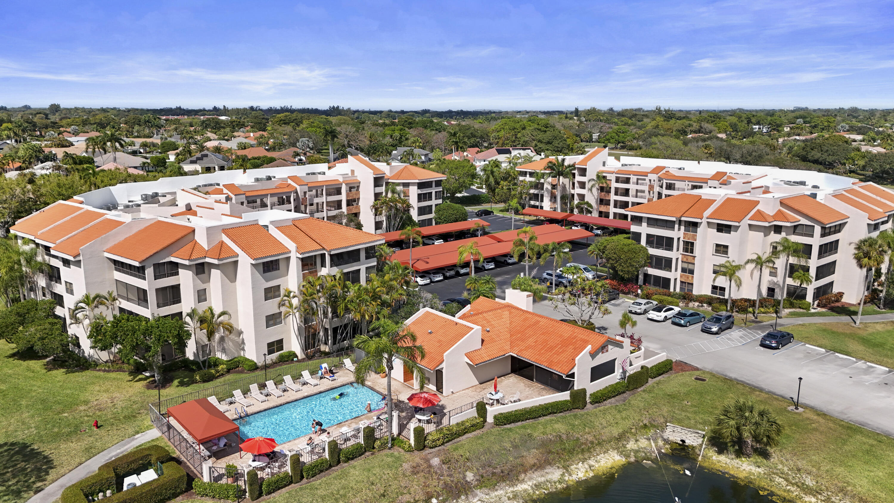 7507 La Paz Boulevard, Unit 407 Boca Raton, FL 33433 - Photo 30 of 31 an aerial view of residential houses with outdoor space
