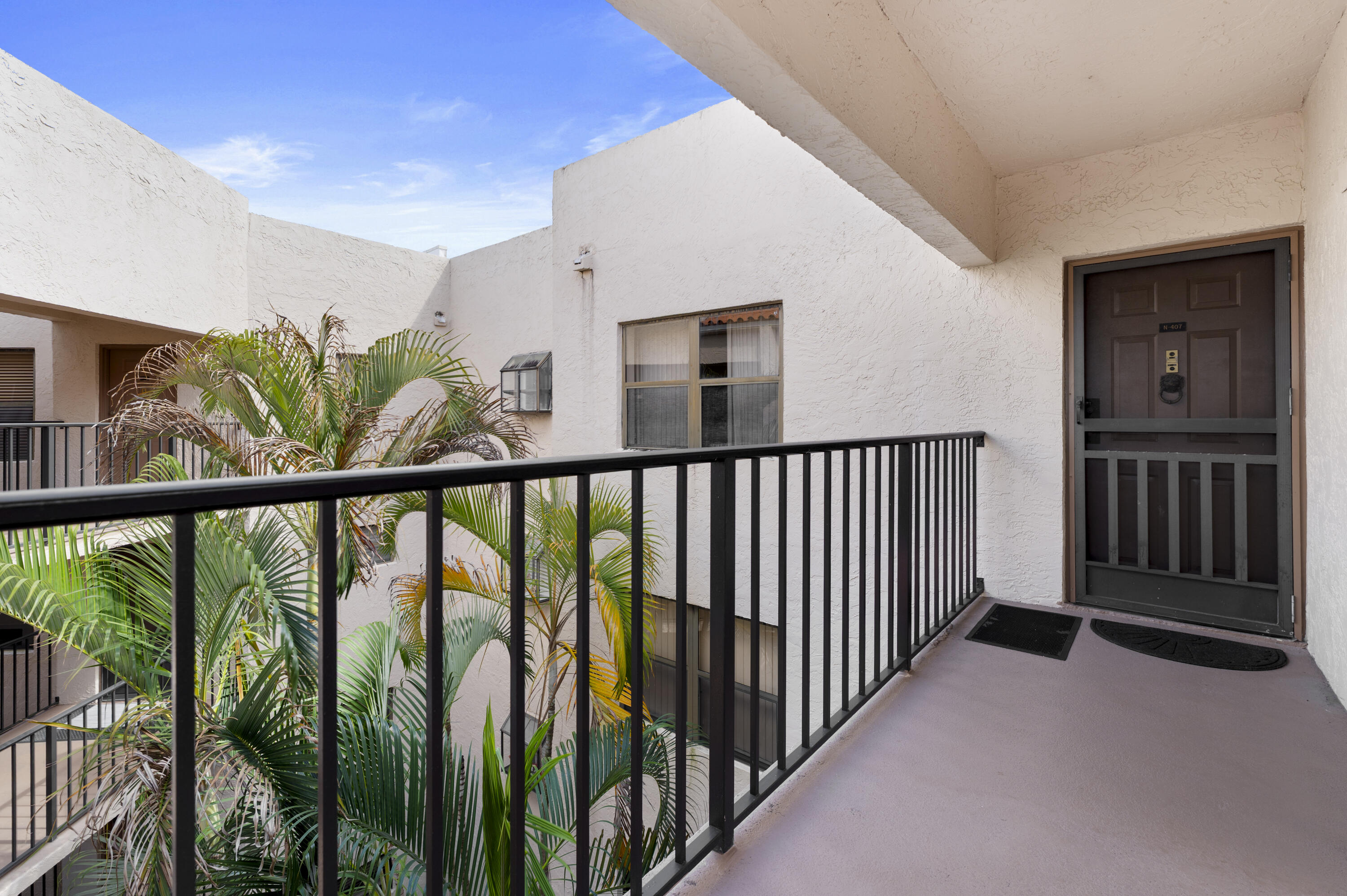 7507 La Paz Boulevard, Unit 407 Boca Raton, FL 33433 - Photo 4 of 31 a view of a balcony