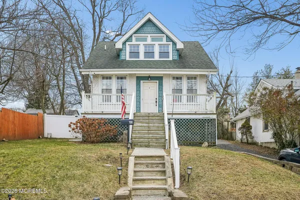 a bathroom with a sink and a yard
