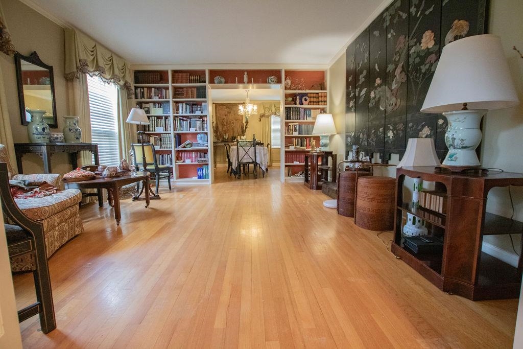320 South Yates Road Memphis, TN 38120 - Photo 4 of 14 a living room with furniture and a wooden floor