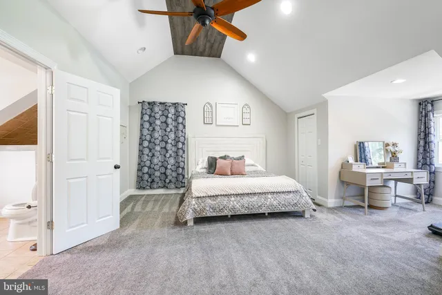 a bathroom with a tub and sink