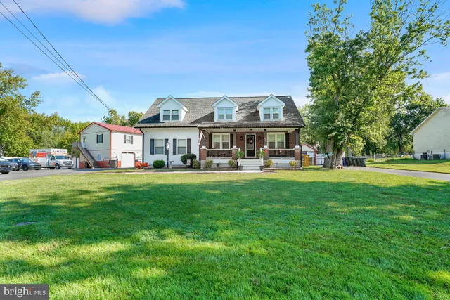 a view of a big yard of front a house
