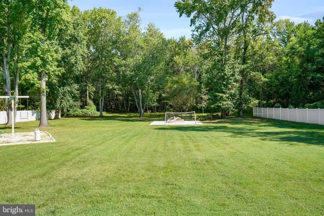 a bathroom with a sink vanity and a mirror
