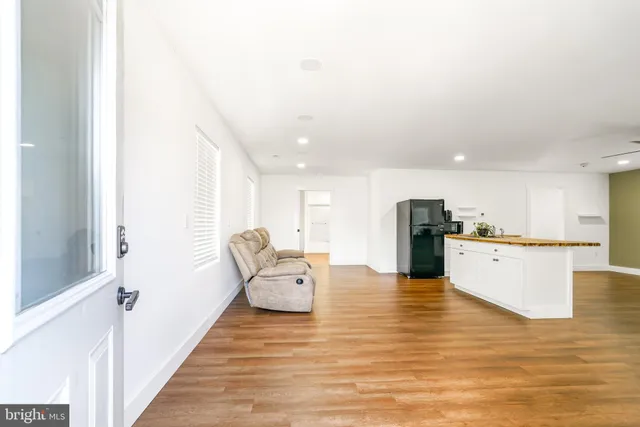 a view of kitchen with wooden floor