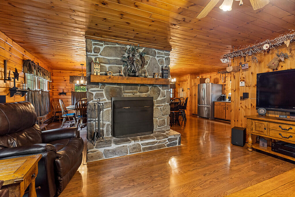 127 Back Road Fairfield, ME 04937 - Photo 22 of 62 22 LR beautiful stone fireplace
